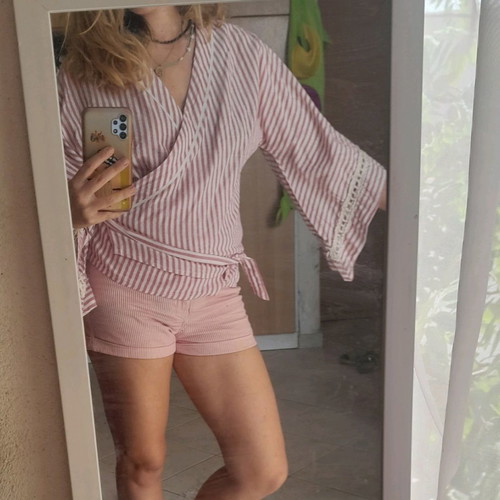 Wrap top used size Large striped pink with knitted details