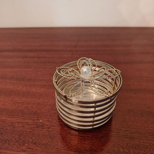 Decorative container used with rust spots