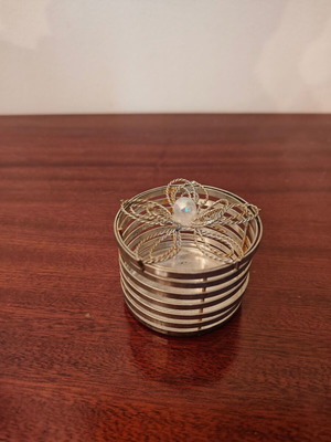 Decorative container used with rust spots