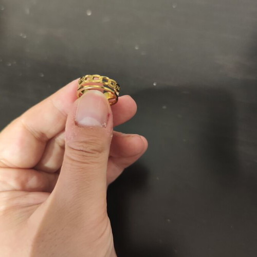 Adjustable stainless steel ring gold color, like new