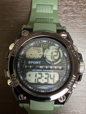 Men's watch new with plastic strap and light button