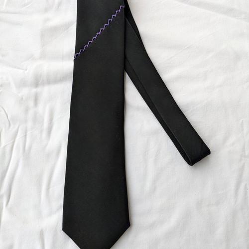 Dkny tie used polyester with lilac embroidery