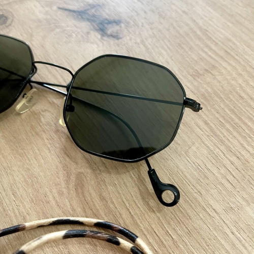 Polygonal statement sunglasses with asymmetrical design and strap