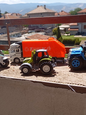 Lot of 4 used medium-sized children's toy vehicles