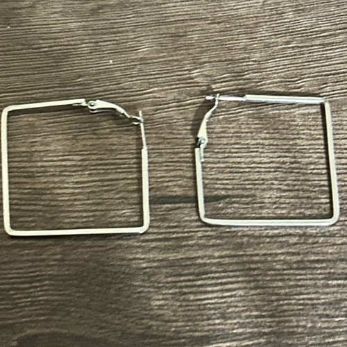 Square earrings like new