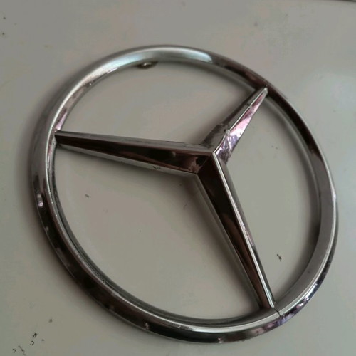 Plastic Mercedes emblem used from truck