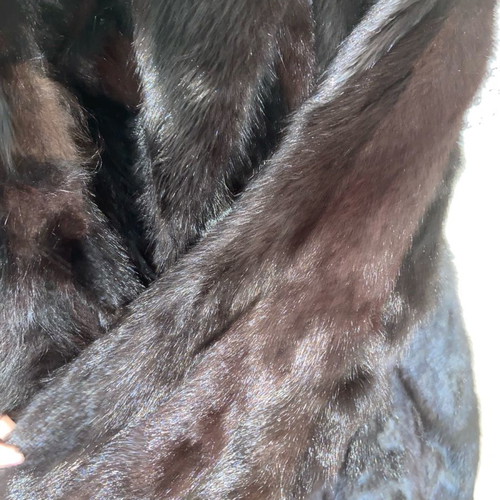Fur genuine one-piece new, black, with pockets