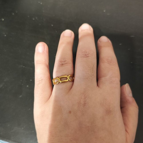 Adjustable stainless steel ring gold tone like new