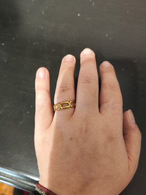 Adjustable stainless steel ring gold tone like new