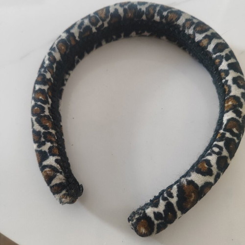 Hairband with leopard print used by abo, black and brown