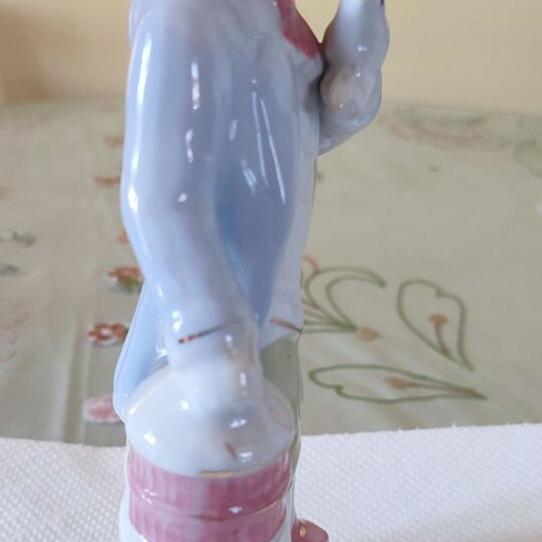 Vintage porcelain figurine Victorian man with bird and cage