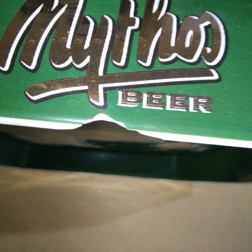 Ceramic Mythos Beer ashtray used with small chip