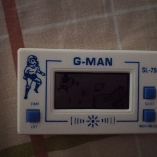 Pocketgame G-MAN SL-75G used electronic game with LCD screen