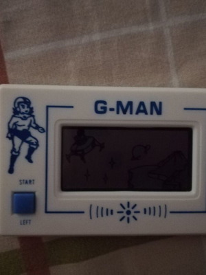 Pocketgame G-MAN SL-75G used electronic game with LCD screen