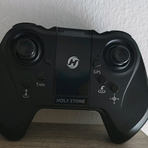 Holy Stone drone used with remote control and spare propellers