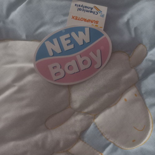 New Baby hypoallergenic baby quilt with ruffles