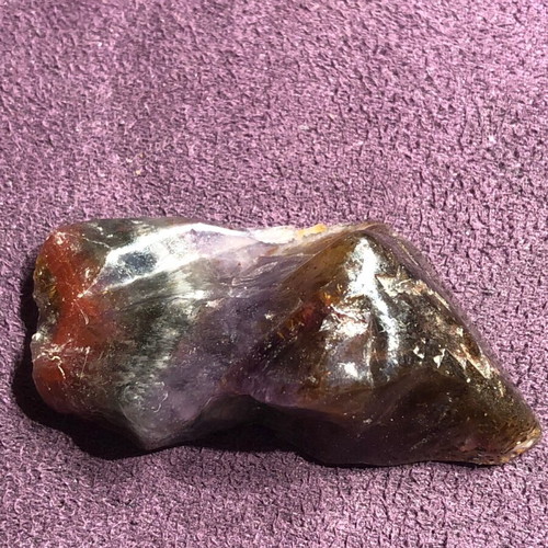 Auralite 23 natural authentic stone with colorful patterns