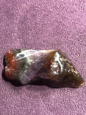 Auralite 23 natural authentic stone with colorful patterns