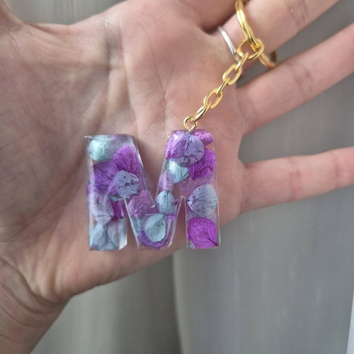 Handmade monogram keychain from resin custom made with purple and turquoise flowers