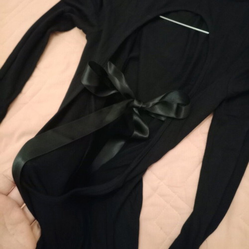 Black turtleneck dress with open back like new, fitted