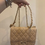 Quilted beige and baby pink nude crossbody bag with gold chain