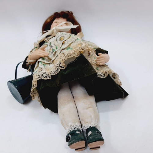 Vintage gardener doll with original outfit and watering can