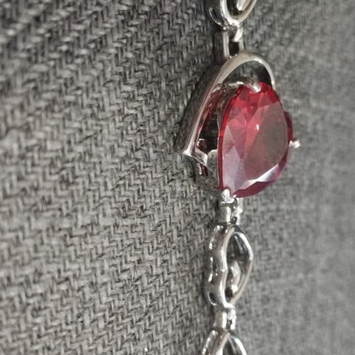 Women's bracelet with red crystal heart and silver elements, like new