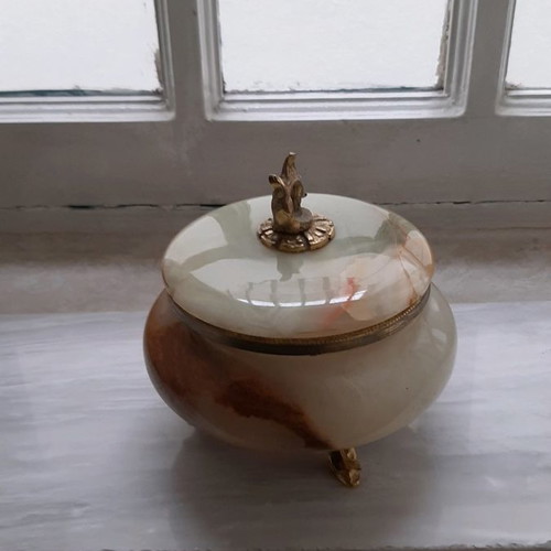 Decorative item used, green onyx with gold legs and handle