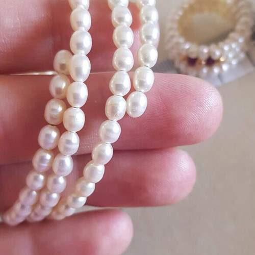 Jewelry set used with pearls, rubies and 14K gold beads bracelet and ring