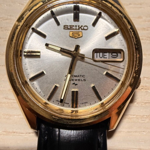 Seiko Sport 5 watch used with black leather strap and daydate