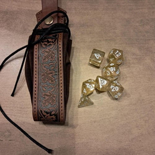 Brown leather dice bag with golden flaked D&D dice set