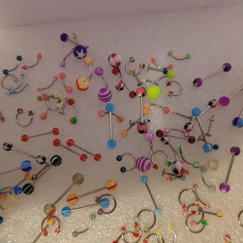 Piercing earrings set like new, 100 pieces, various designs and colors