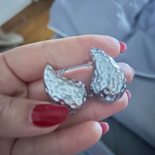 Earrings new, finely carved steel