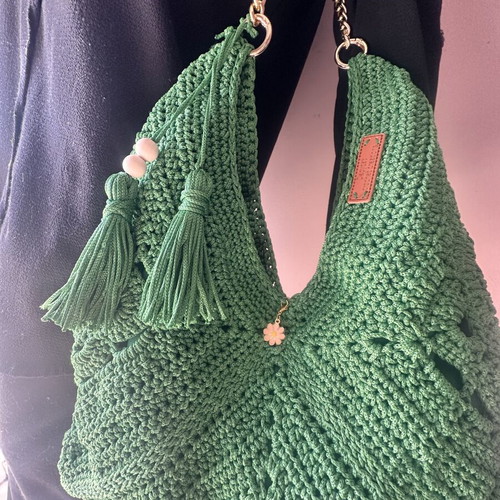 Handmade green shoulder bag with gold chain and decorative tassels