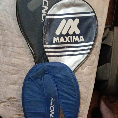 Rackets and cases used, various models including vintage Santos and Wilson