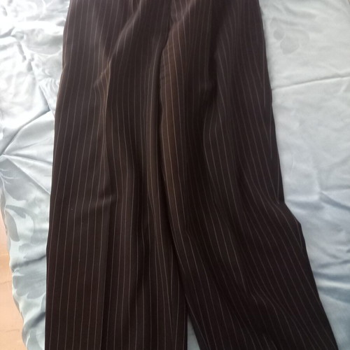 Elegant black suit with thin yellow stripes size 42 used by Lola