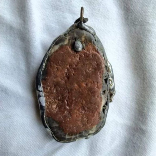 Vintage pendant like new made of stone, tin, and coral