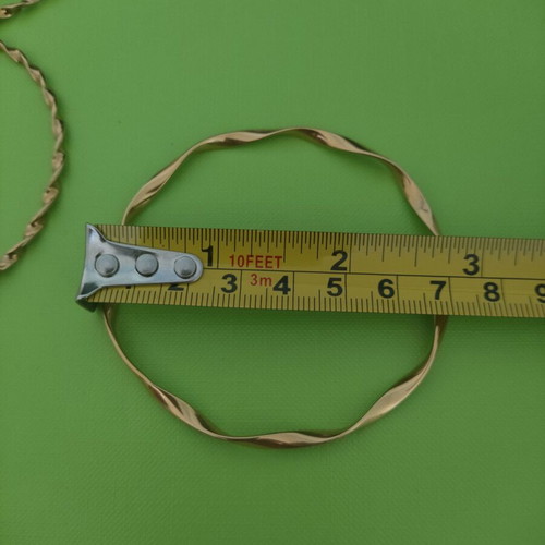Stainless steel jewelry set used, gold color, includes bangle and hoop earrings