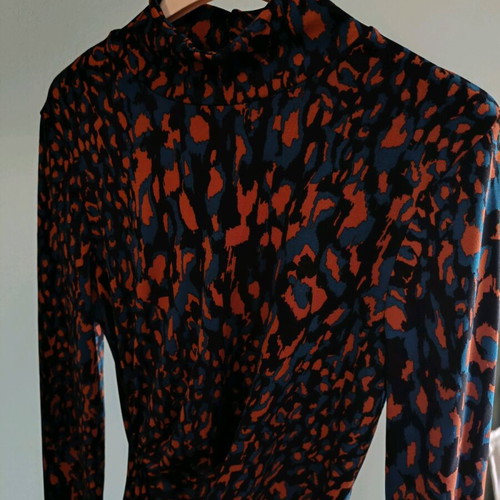 Midi dress like new with draped detail and animal print