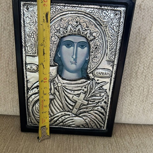 Religious icon used with metal overlay on wooden base