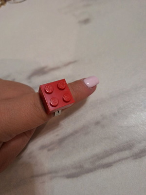 Ring with red Lego design