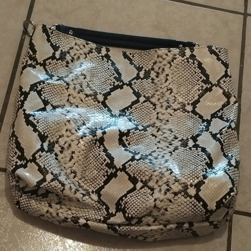 Large two-in-one bag with magnetic closure like new, unused