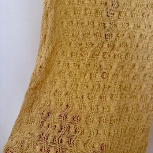 Yellow sleeveless knitted dress like new with geometric pattern and white trims