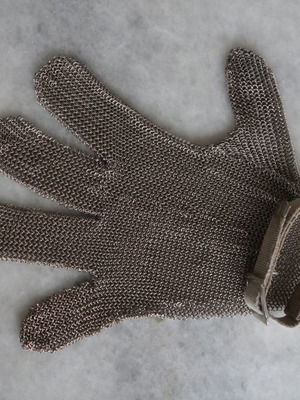 Metal mesh protective glove used for professionals