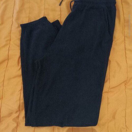 Velvet women's pants used, size L, black with pockets and elastic cuffs