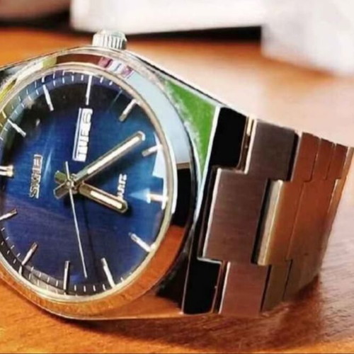 Skmei 70's Style Watch new, men's quartz with integrated bracelet