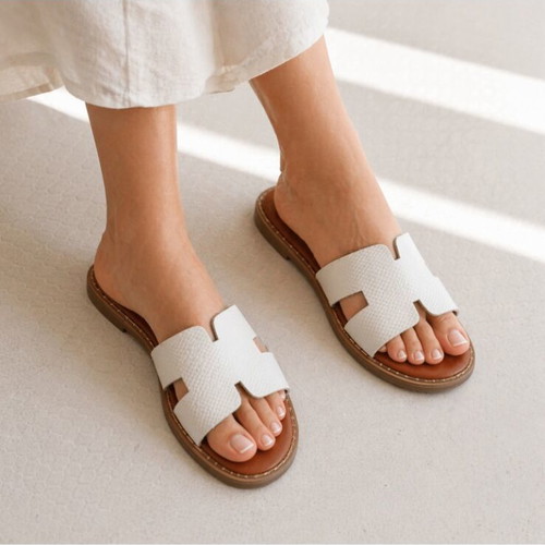Flat sandals with side cutouts new, black and white