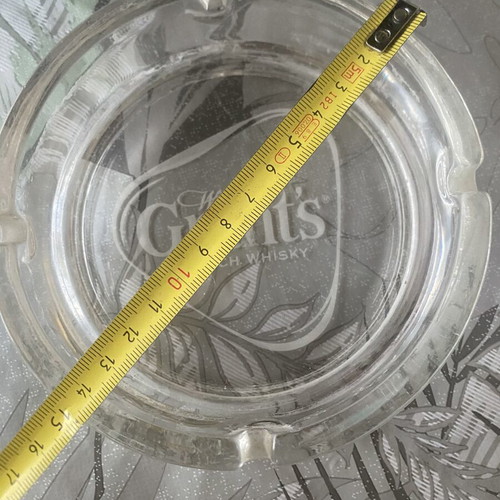 Glass ashtray used with Grant's whisky logo