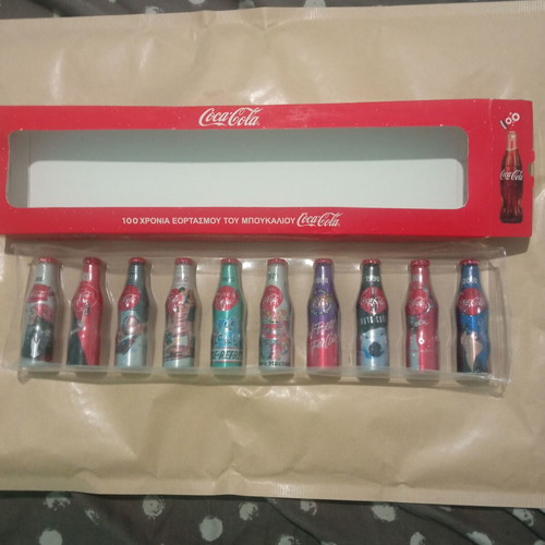 Coca-Cola Mini Bottles 100 Years Collectible Set like new