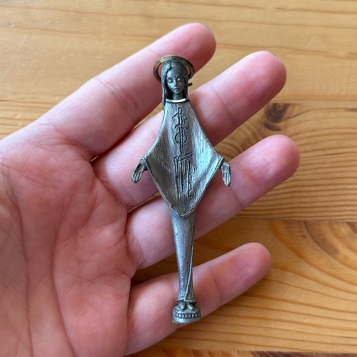 Metal Virgin Mary figurine used, modern design